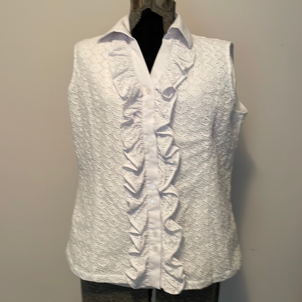 Blouse sleeveless. Ravel. Size large. White eyelet. Good condition never worn.